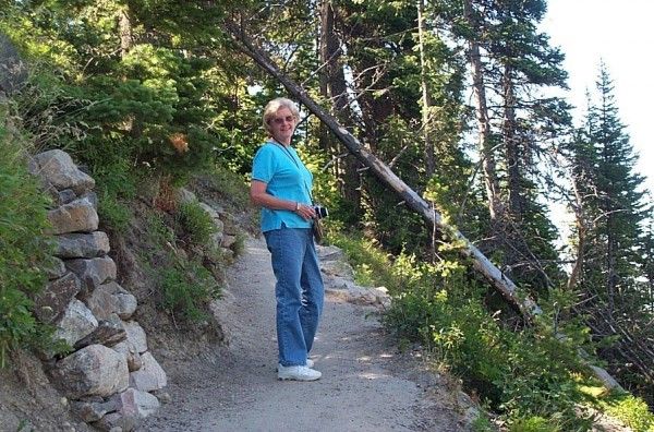Jo Anne shown hiking in Teton National Park, Wyoming